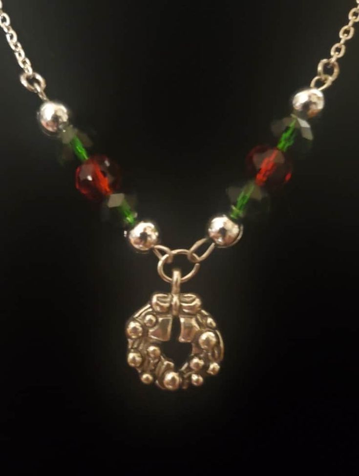 Handmade one of a kind jewelry. Silver Christmas Reef Necklace accented by red and green beads, accompanied by a silver chain. Whether you want to wear this for Christmas or give it as a gift you can't go wrong. Christmas Reef, Octopus Necklace, Dragon Earrings, Green Beads, Silver Christmas, Jewelry Silver, Green Bead, Gold Pearl, Star Earrings