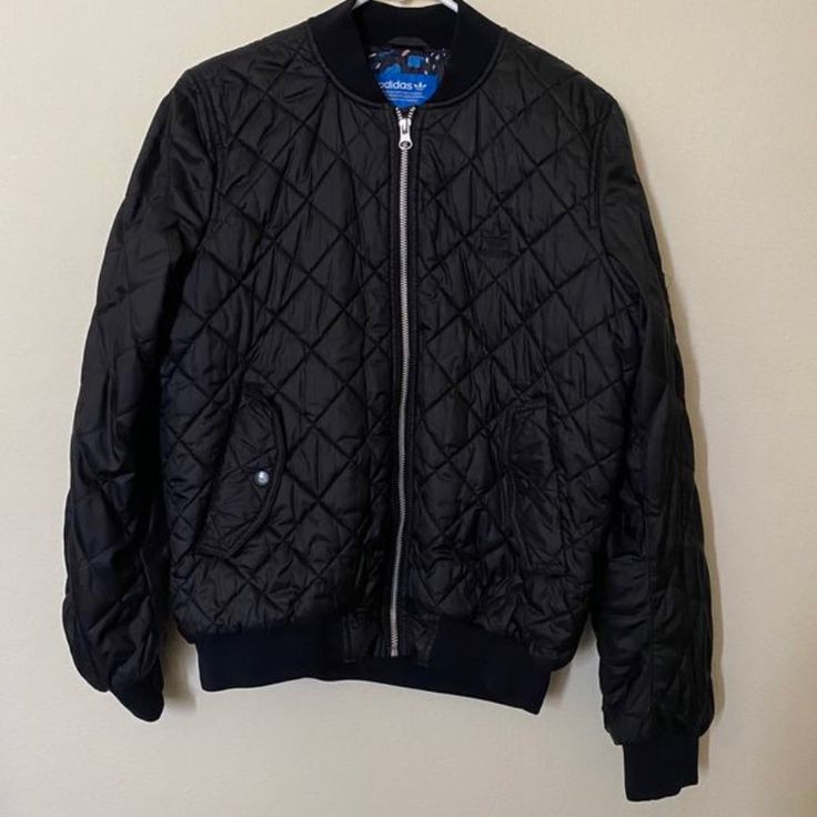 Barely Worn Adidas Puffer Jacket. Only Worn A Few Times, Haven’t Worn It In Years. Nothing Wrong With It Just Not My Style. It Has A Beautiful Floral Print All In The Inside. Looks Brand New And Perfect With This Weather As It Is Getting Chilly. Size Small . Very Rare. #Adidas #Jacket #Pufferjacket #Bomberjacket Size:Small (Women’s) Can Also Fit An Xs For That Baggy Look. Casual Black Quilted Jacket With Pockets, Casual Black Quilted Jacket For Spring, Casual Quilted Jacket With Ribbed Cuffs For Streetwear, Black Quilted Jacket With Pockets For Streetwear, Black Casual Quilted Puffer Jacket, Casual Black Quilted Outerwear, Trendy Black Adidas Outerwear, Casual Black Adidas Outerwear, Adidas Urban Outerwear With Ribbed Cuffs