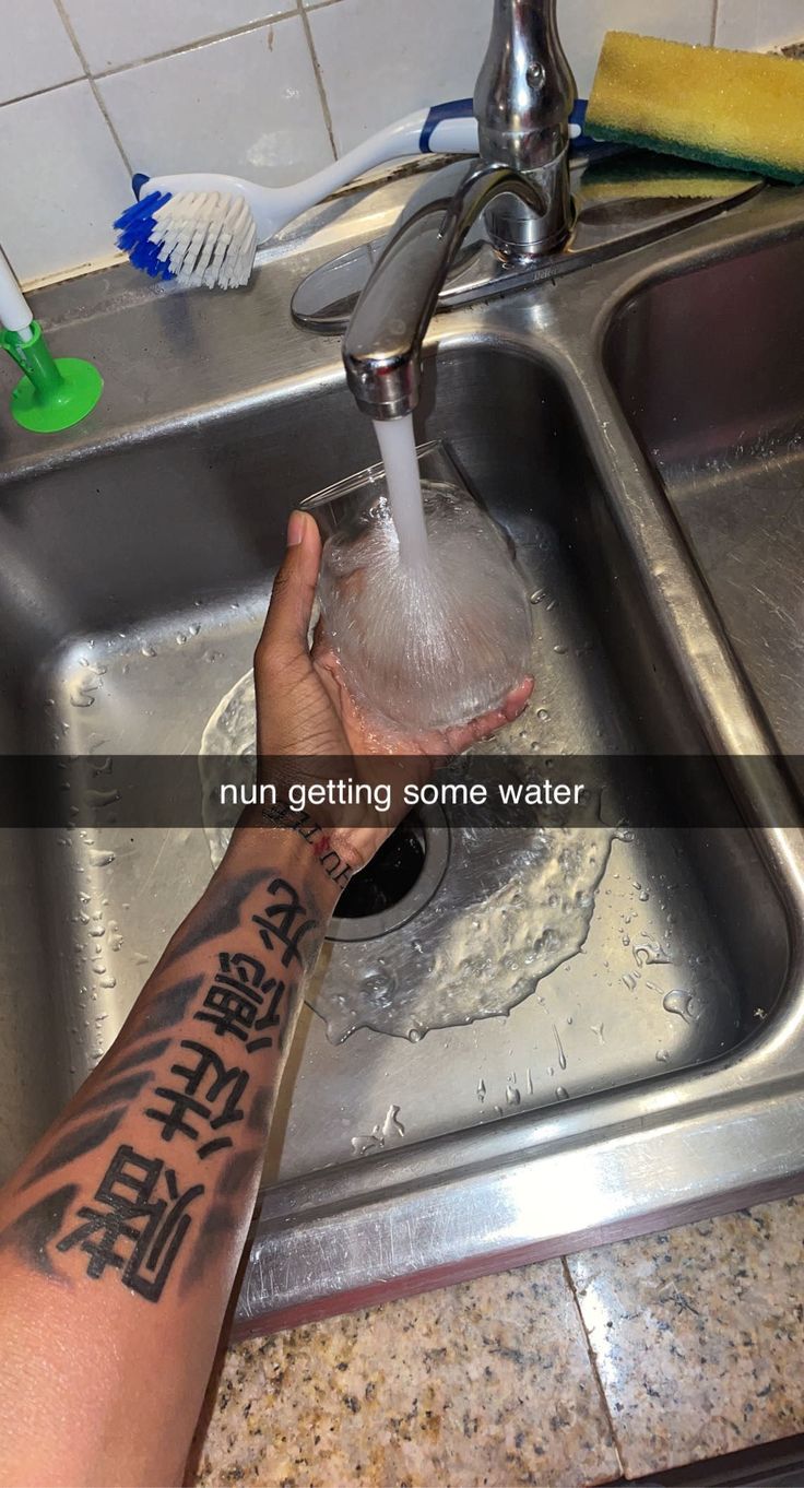 a person washing their hands in a sink with the words run getting some water written on it