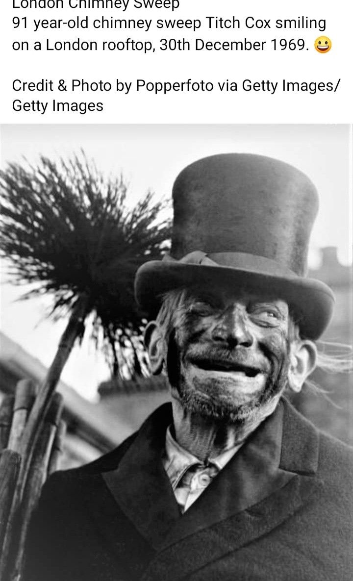 an old man wearing a top hat and coat with a feather on it's head