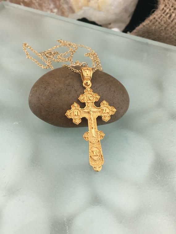 ✪ ATTENTION!! ✪ Please check the dimensions to be sure about the size! This cross is a unique Byzantine jewel! It is beautiful and you can find it only here!! It is solid gold 14k and it has the Jesus Christ and the ICXC NIKA. It has special loop too, with a mini cross as you can see in the photos! It is perfect for women and men too! Also you can choose it if you are looking for a unique baptism cross! You will love it! ! ✪✪✪ Express Shipping with DHL courier in your address ✪✪✪(about 1-2 busin Engraved Yellow Gold Cross Pendant Necklace, Engraved Yellow Gold Cross Necklace, Yellow Gold Crucifix Necklace For Baptism, 14k Gold Crucifix Cross Necklace, 14k Gold Crucifix Necklace Spiritual Style, Gold Crucifix Cross Necklace For Baptism, 14k Gold Crucifix Necklace For Spiritual Wear, Personalized Gold Pendant Cross Necklace, Yellow Gold Hallmarked Crucifix Cross Necklace