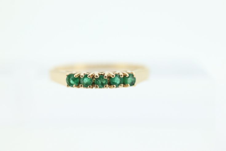 Emerald  Eternity band. Anniversary Band Emerald 2.5mm round 1.4grams total 14k yellow gold 8size Beautiful light green color. Yellow Gold Emerald Half Eternity Ring, 14k Gold Green Half Eternity Ring, Green Half Eternity Ring In 14k Gold, Gold Emerald Eternity Band In Fine Jewelry Style, Classic Green Gemstone Eternity Band, Emerald Eternity Band, Emerald Gem, Akoya Pearls, Anniversary Bands