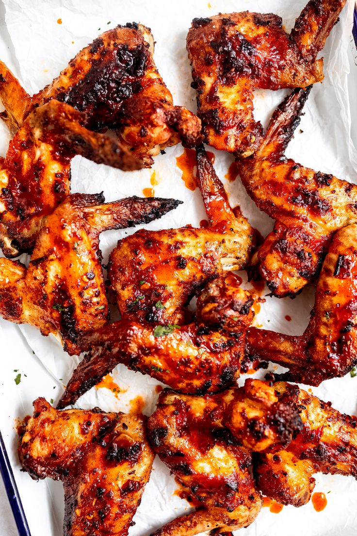 grilled chicken wings with barbecue sauce on top