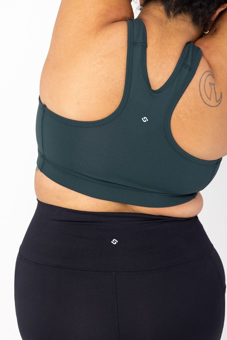 The perfect combo: Support + Comfort. Featuring our top rated SuperHold™ compression fabric, tricot knit liner, and the best plus size fit on the planet. Unlike other bras that you can't wait to take off at the end of the day, our plus size racerback sports bra provides the support you need for medium/high impact activities and is comfy enough to wear all day. As soon as you put one on you'll know it was designed for YOUR body. *SELF Magazine Activewear Awards - Best Sports Bra 2023 Supportive Functional Tops With Built-in Padding, Green Compressive Activewear With Medium Bust Support, Green Activewear With Medium Bust Support And Stretch, Versatile Compressive Tops With Built-in Padding, Supportive Medium Bust Support Versatile Activewear, Green Sports Bra With Medium Bust Support, Functional Activewear With Medium Bust Support And 4-way Stretch, Supportive Versatile Activewear With Medium Bust Support, Green Functional Sports Bra With Medium Bust Support