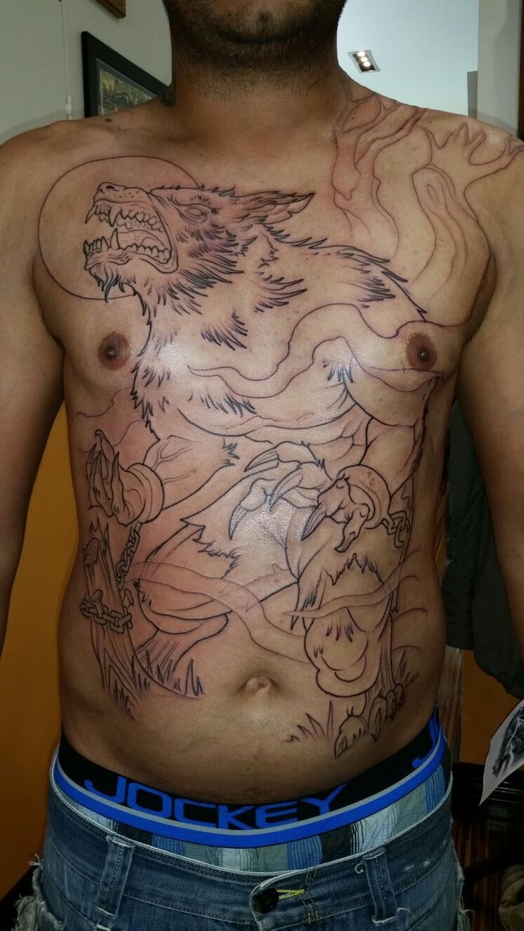 a man with a dragon tattoo on his chest