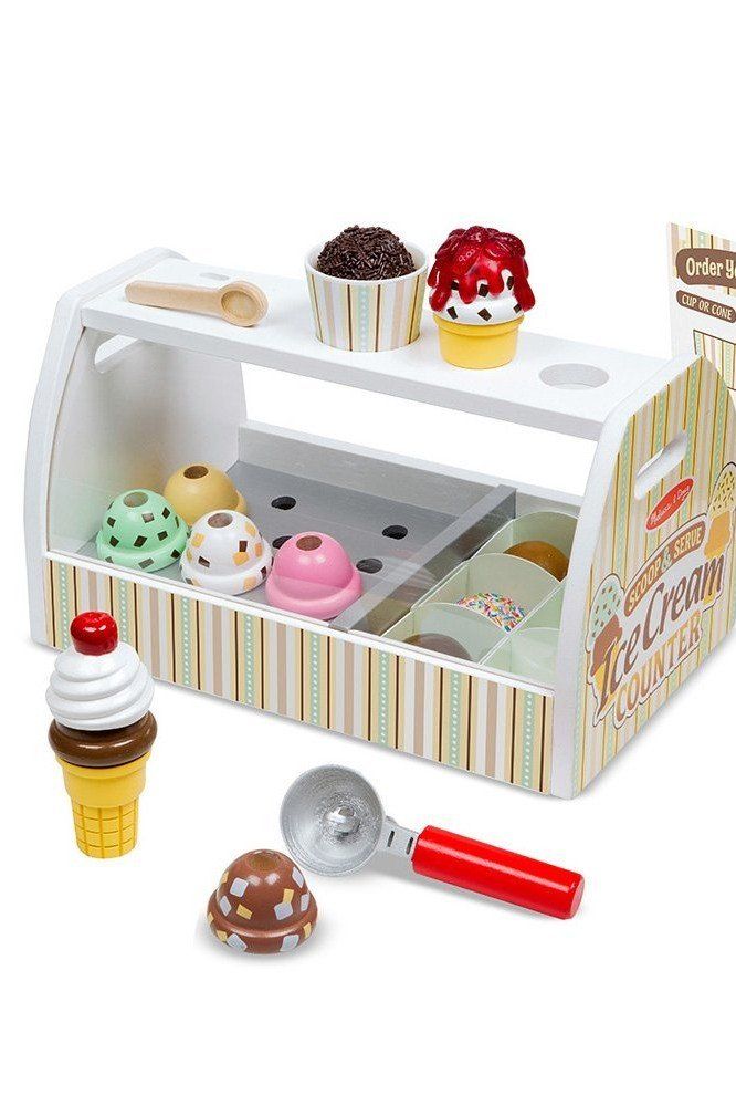 an ice cream shop playset with cupcakes and other treats