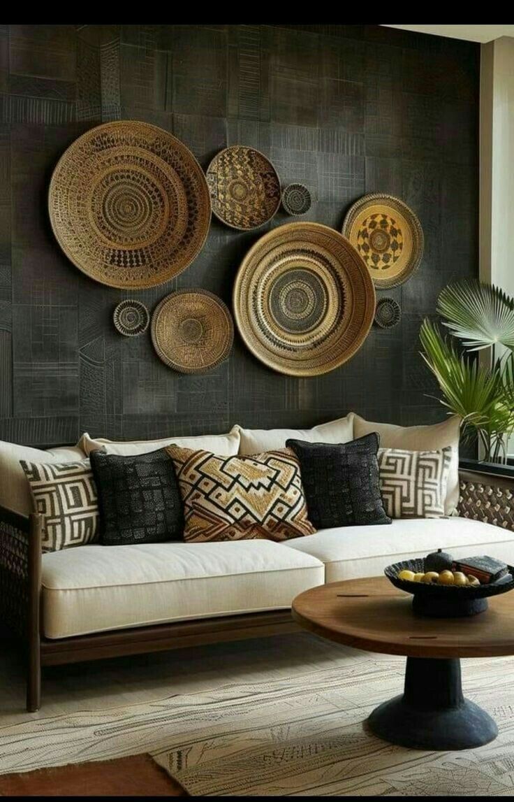 a living room filled with lots of furniture next to a wall mounted wicker art