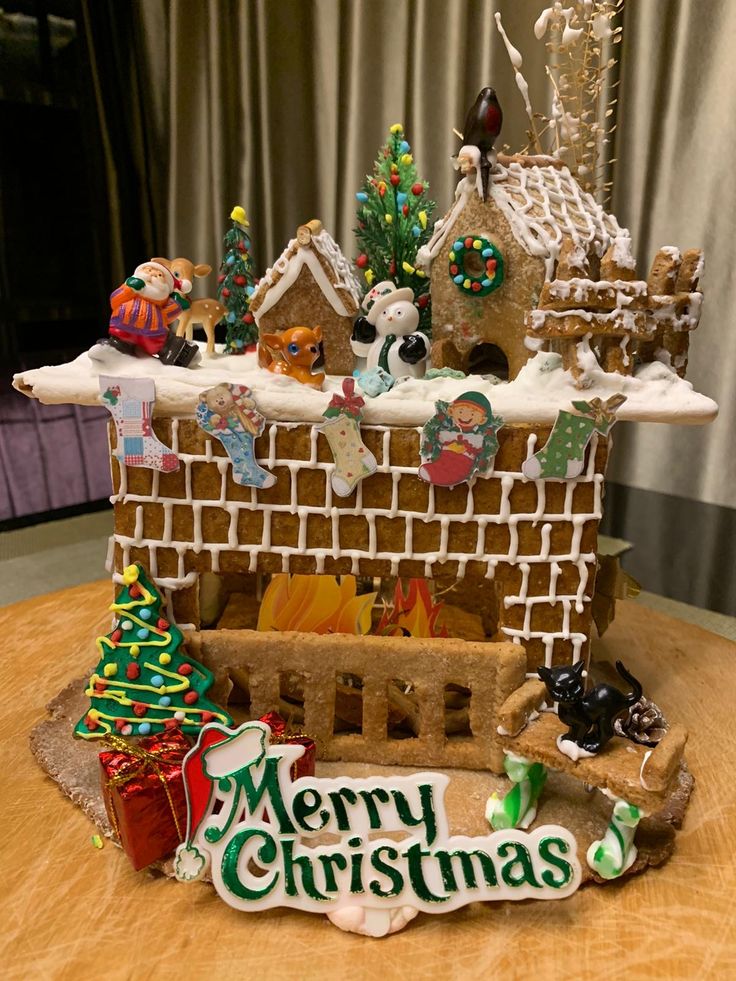 a gingerbread house made to look like a christmas village