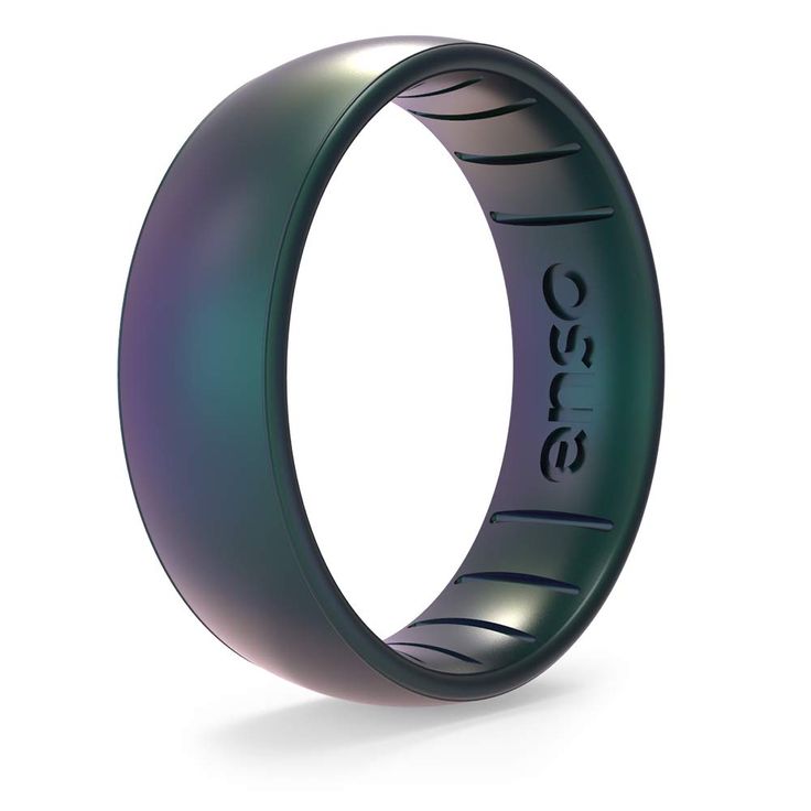 an image of a ring that is green and black with the word boss engraved on it