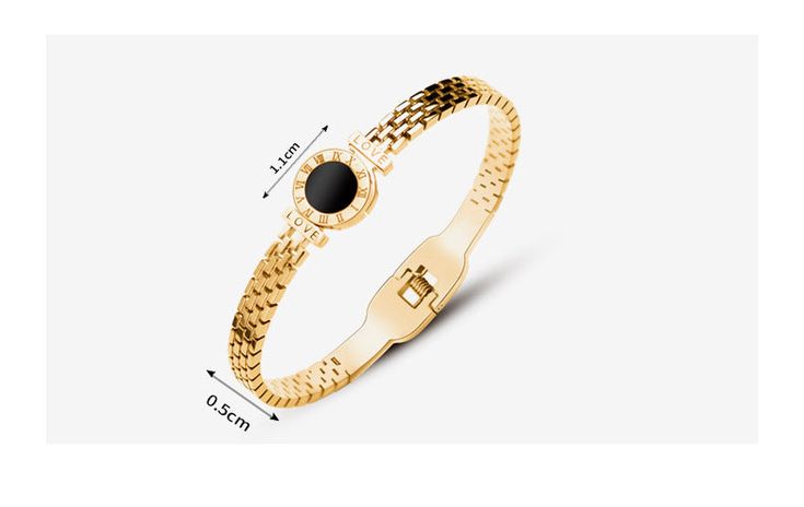 It's the touch of the maker's hand that makes it extra special for us. The modernized technique is textile to bring this cuff bracelet to perfection with 18k gold plating for a long-lasting gleam. The dial in the centre is filled with black enamel and accelerated by subtle Roman numeral engravings. Our TBC bracelet makes up for a perfect stand alone piece. Design: Plating Pattern: Geometric Insert Material: No Inlaid Occasion: Housewarming, anniversary, business, wedding, travel, birthday, festi Formal Stainless Steel Cuff Bracelet, Formal Round Stainless Steel Cuff Bracelet, Black Adjustable Elegant Gold Bracelet, Elegant Black Bangle Gold Bracelet, Elegant Adjustable Black Gold Bracelet, Elegant Black Adjustable Gold Bracelet, Elegant Black Gold Bangle Bracelet, Black Gold-plated Bracelets, Elegant Black Bracelet With Strap