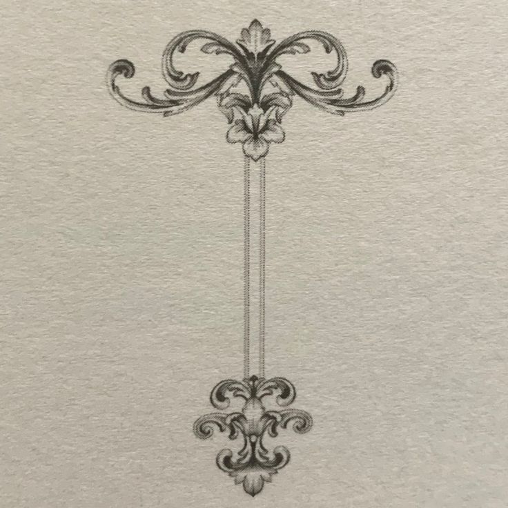 a drawing of an ornate design on a piece of paper