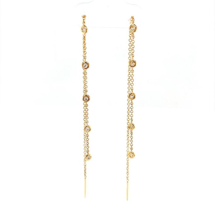 These threaders feature five bezel set diamonds on 14k yellow gold chain. Elegant, modern & perfect for any occasion! 14k yellow gold .12ctw Sold as a pair Yellow Gold Bezel-set Dangle Diamond Earrings, Gold Linear Earrings With Single Cut Diamonds, Gold Dangle Diamond Earrings With Bezel Setting, Yellow Gold Dangle Jewelry With Bezel Setting, Bezel Set Diamond, Yellow Gold Chain, Threader Earrings, Bezel Diamond, Bezel Setting