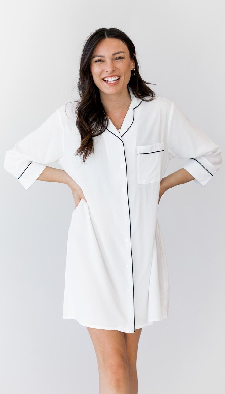 Satisfaction Guaranteed: We offer a full merchandise refund on sleep shirts if you are not 100% happy with your order. Bridesmaid sleep shirts created specifically for bridal parties! Designed to make everyone feel comfortable (and photo ready!) while prepping for the wedding. With the button down front, easily change into your dress without ruining hair and makeup. Plus, take adorable photos as you get ready with your coordinating bridal party! Sizing The bride & bridesmaid sleepshirt is intend White Long Sleeve Relaxed Fit Nightgown, White Long Sleeve Sleep Chemise, Elegant Short Sleeve Sleepwear For Wedding Night, White Chemise For Sleepover, White Short Sleeve Sleepwear For Wedding Night, Elegant Short Sleeve Sleep Tops, White Short Sleeve Nightgown For Pajama Party, White Short Sleeve Nightgown For Sleepover, White Short Sleeve Top For Sleepovers