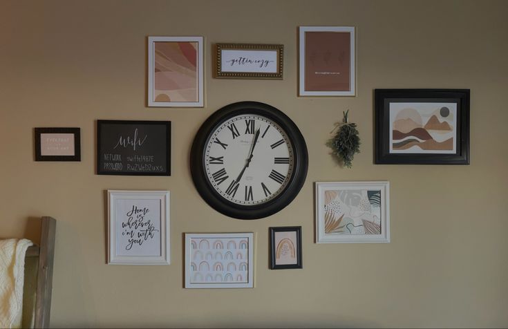 a clock mounted to the side of a wall covered in pictures and framed with photos