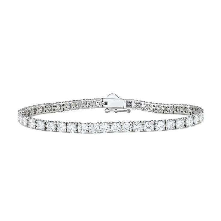 Captivate time and time again whenever you wear this 14k white gold Charles & Colvard tennis bracelet. Captivate time and time again whenever you wear this 14k white gold Charles & Colvard tennis bracelet.Click on this JEWELRY & WATCHES GUIDE to learn about fit, styles, materials and more! Length: 7 in. Metal: 14k white gold Plating: rhodium Finish: polishedSTONE DETAILS Total carat weight: 9 9/10 ct. Stone type: lab-created moissanite Shape: round brilliant Setting: prong Diamond equivalent car Time And Time Again, Jewelry Clasps, Tennis Bracelet, Gold Plating, Round Brilliant, 9 And 10, Jewelry Watches, Tennis, Gold Plate