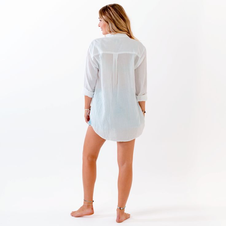 Never sacrifice style for comfort again! Rock our Boyfriend Button Up all around town, from the beach to the street. Crafted with breathable 100% cotton and natural coconut shell buttons, this lightweight long sleeve top has an oversized fit. Throw on as a swim cover-up after a quick dip in the ocean or styled with jeans for brunch with the gals. Note: The black and white styles boast a lightweight 1-ply cotton for coverage, while the new sage color rocks a thicker 2-ply cotton, ensuring the coz Relaxed Fit Long Sleeve Top For Beach Cover-up, Lightweight Long Sleeve Beachwear Cover-up, Beachy Upf 50+ Tops For Spring, Beachy Tops With Upf 50+ For Vacation, Casual Tops With Upf 50+ For Beach, Beachwear Long Sleeve Blouse Cover-up, Relaxed Beach Cover-up Tops, Beachwear Long Sleeve Blouse For Beach Cover-up, Long Sleeve Blouse For Beach Cover-up