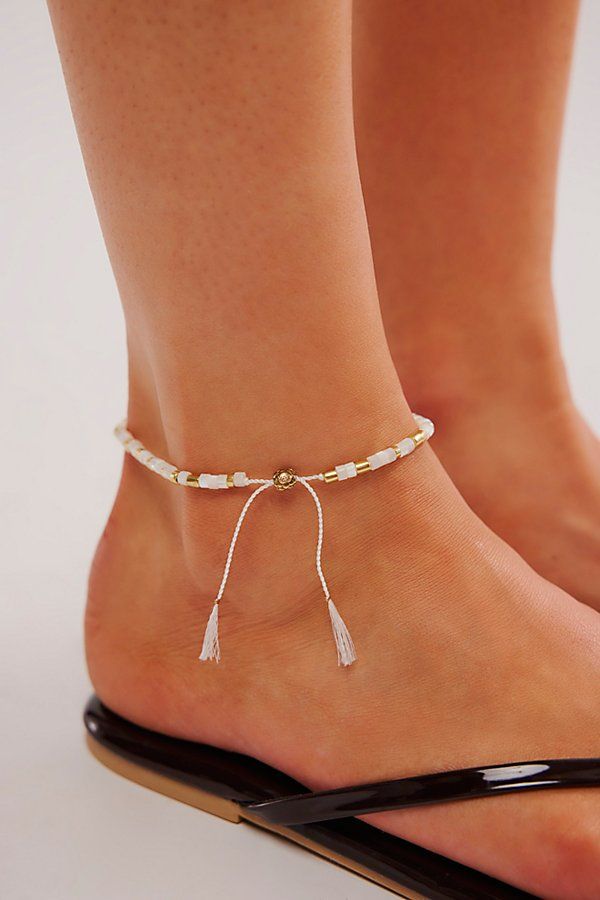 Designed to add the perfect little something extra to absolutely every look, this effortless anklet is featured in a forever classic beaded design with varying shapes and finishes for a super cool, collected style. | Sun Moon Rain Anklet by Free People in White Elegant Beaded Summer Anklets, Trendy Adjustable Anklets With Tiny Beads, Adjustable Beaded Ankle Wrap Jewelry, Spring Anklets With Colorful Beads, Elegant Colorful Beaded Bracelets For Summer, Festival Anklets With Adjustable Length, Adjustable White Anklets For Spring, Festival Adjustable Anklets, Trendy Adjustable Ankle Wrap Jewelry