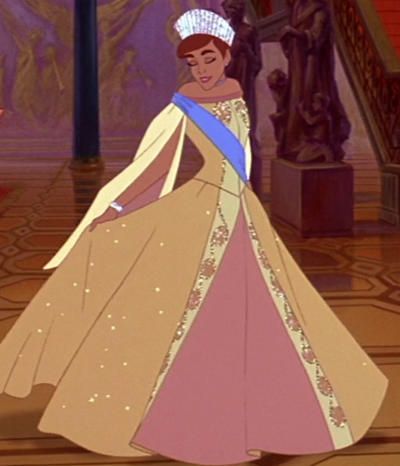 the princess from disney's beauty and the beast is wearing a tiara in her dress