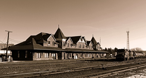 an old train station is shown in sepia