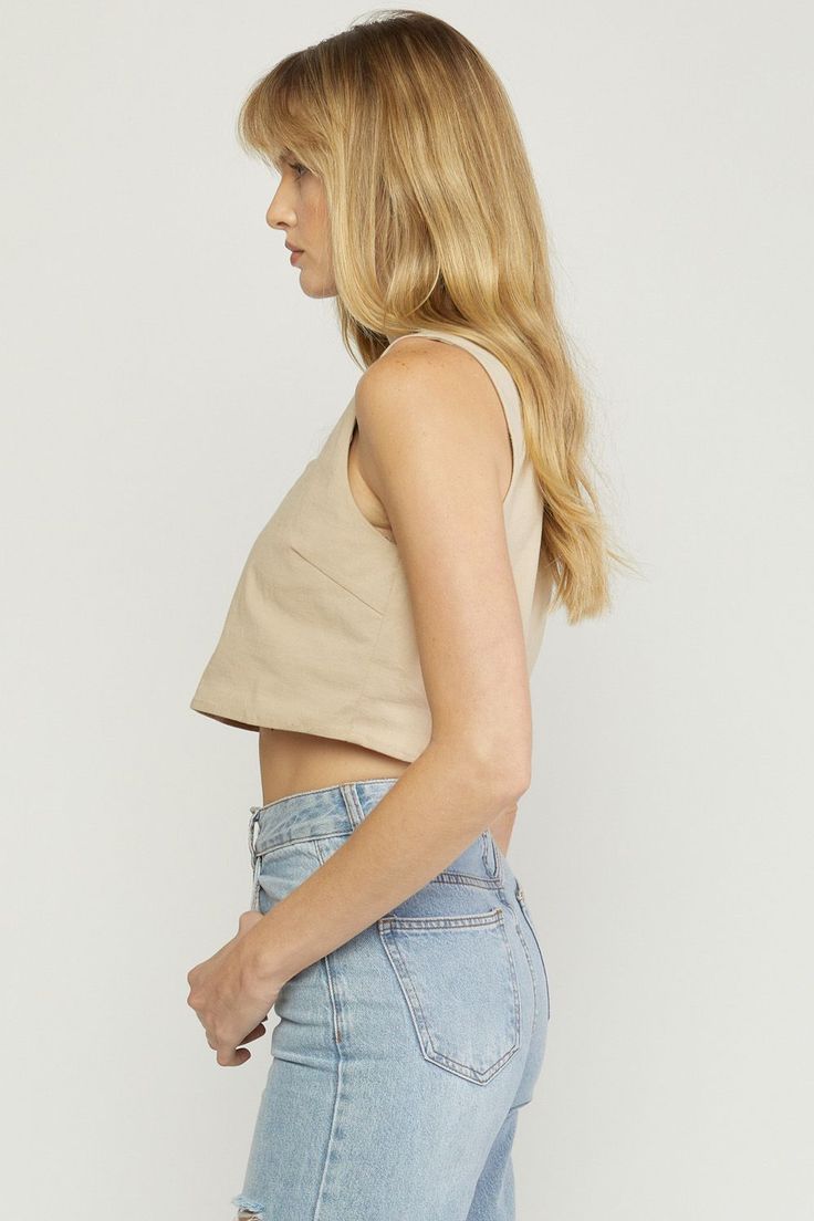 Description Introducing our Let Me Know crop top! Perfect for those hot Summer-Fall transition days, this lightweight sand top features a square neckline and sleeveless design and will be your go-to for days when you want to look cute and stay cool. So if you're feeling bold and ready for a show-stopping look, let us know! Specs Self: 97% Cotton | 3% Spandex Lining: 100% Hand wash cold Line dry Fits true to size - model is wearing a small S (0-4), M (6-8), L (10-12) SKU#: IS-003250 Please note that all online inventory reflects inventory in store. Summer Cotton Crop Top With Square Neck, Cotton Square Neck Tank Top For Day Out, Casual Slightly Cropped Tank Top For Summer, Casual Slightly Cropped Summer Tank Top, Chic Crop Top Tank For Everyday, Casual Slightly Cropped Tank Top For Spring, Versatile Beige Cotton Tank Top, Everyday Spring Tank Crop Top, Chic Cropped Tank Top For Everyday