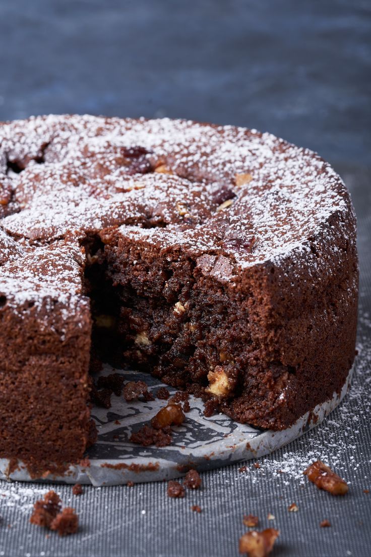 a chocolate cake with one slice cut out