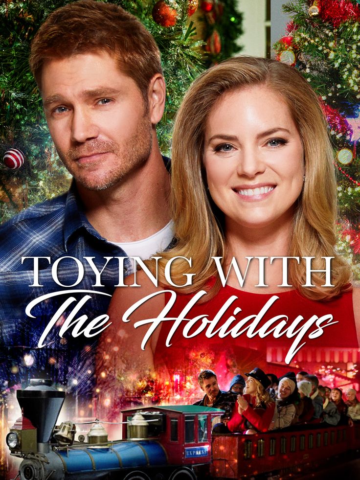 a man and woman standing next to each other in front of a christmas tree with the words toying with the holidays on it