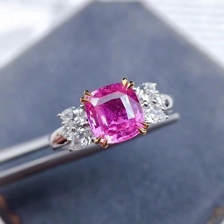 Pink Sapphire and Diamond Engagement Ring:Main Stone: Natural Pink Sapphire 1.4-1.5 ct Side Stones: Natural Diamonds 0.4 ct Metal: 14K Solid GoldCustom Order:This Unique Pink Sapphire Engagement Ring can be customised in Rose,White and Yellow Gold. The Sapphire has a gorgeous pink color. This stunning sapphire ring is offered in other sizes, metal, and the central stone can be upgraded/downgraded to suit your preference and budget. We have a great selection of Sapphires as well as other natural Luxury Pink Sapphire Classic Diamond Ring, Pink Diamond Sapphire Ring, Gia Certified, Rose Gold Sapphire Ring With Vvs Clarity Diamond, Gia Certified Pink Diamond Ruby Ring, Gia Certified Pink Sapphire In White Gold Ring, Gia Certified Rose Gold Diamond Ring, Gia Certified White Gold Ring With Pink Sapphire, Gia Certified Pink Sapphire Diamond Ring Gift, Gia Certified Pink Sapphire Diamond Ring In Fine Jewelry