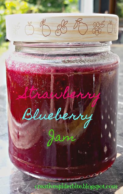 a jar filled with liquid sitting on top of a table