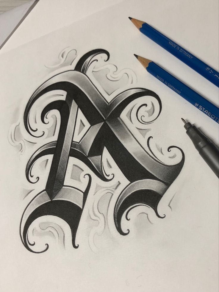 a drawing of the letter a with some pencils