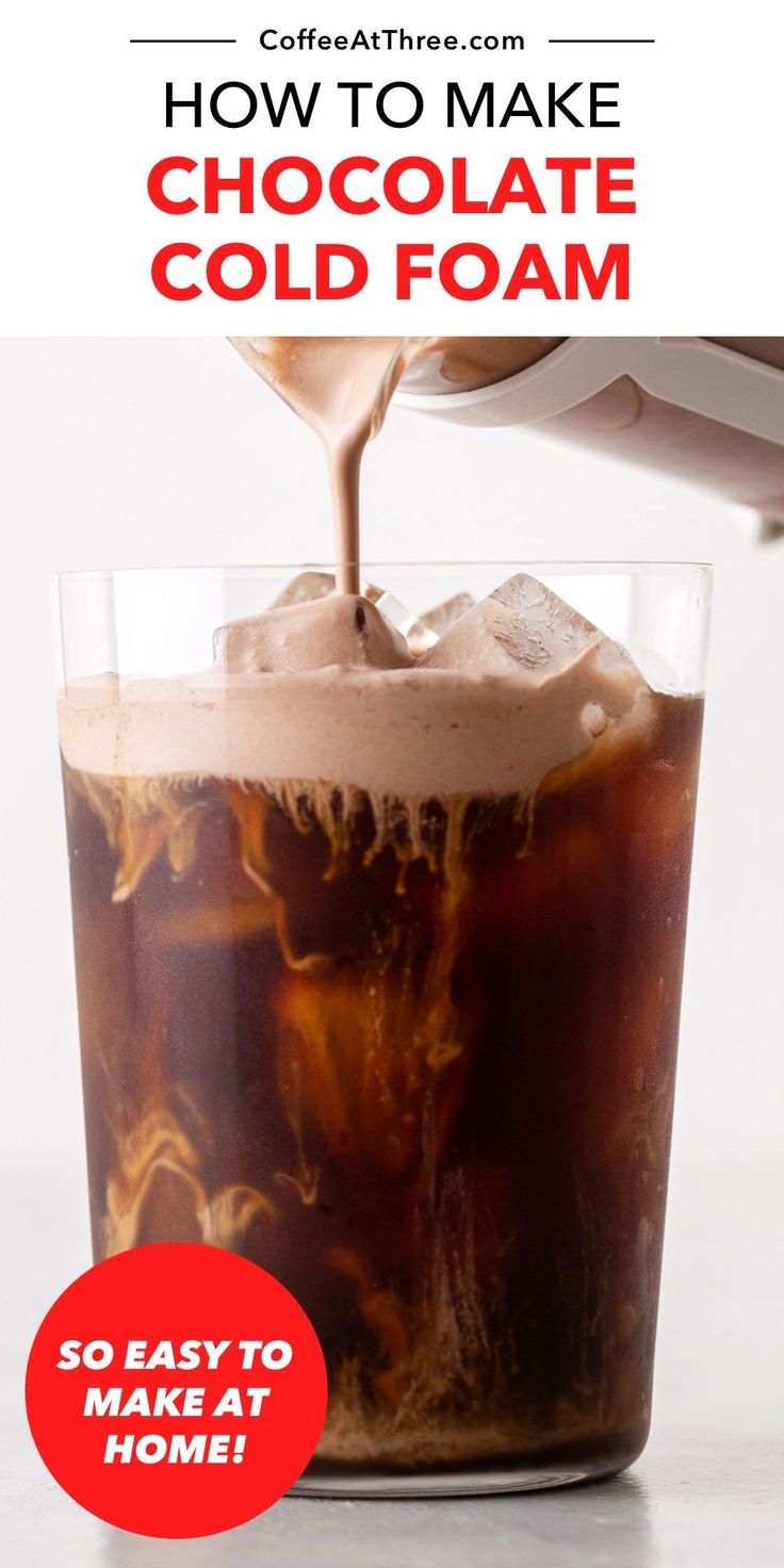 how to make chocolate cold foam in a glass with ice and coffee being poured into it