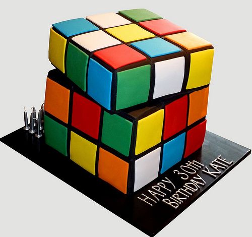 a birthday cake made to look like a rubik cube