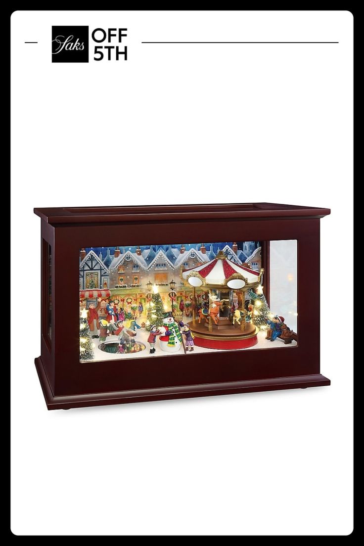 a christmas display case with an image of a carousel