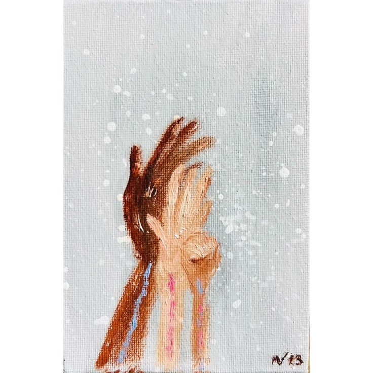 a painting of a woman's hand with snow falling on her face and the background is blue