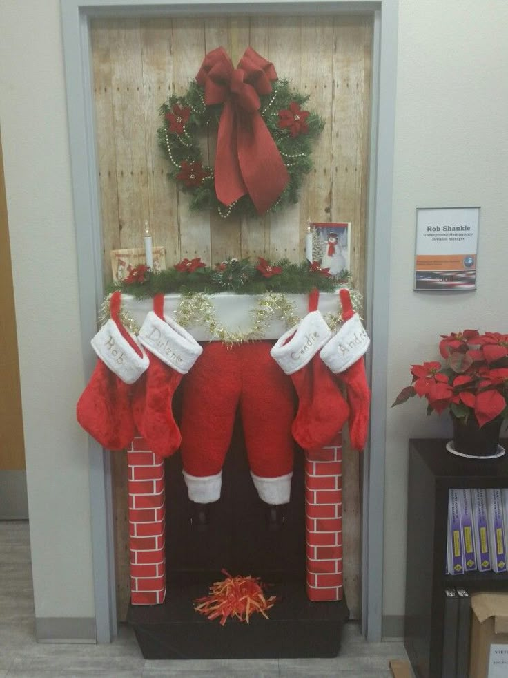 a decorated fireplace with stockings and stockings on it