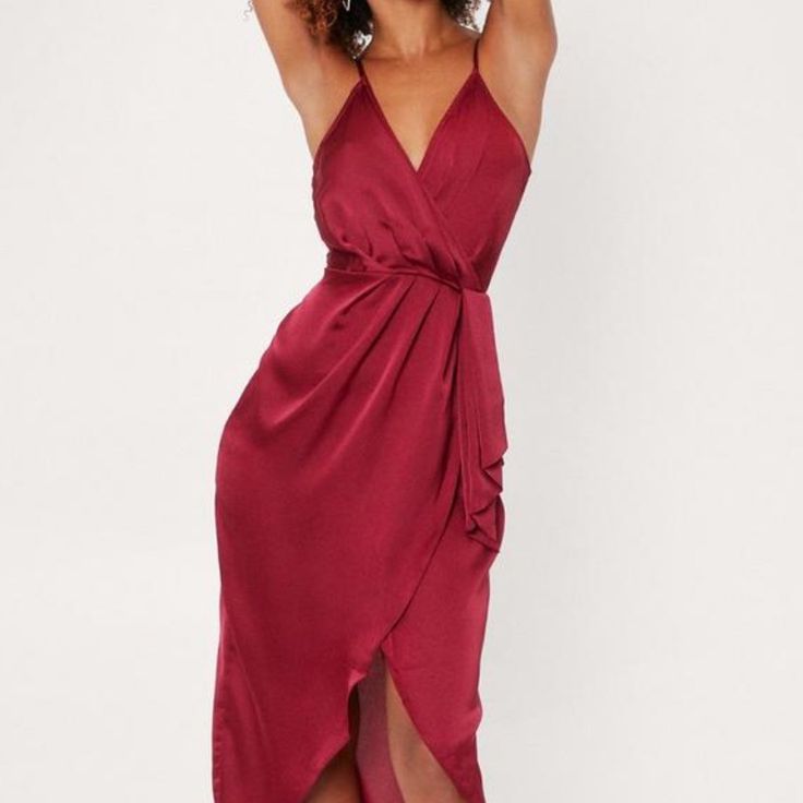 This Dress Comes In Satin And Features A Midi Silhouette, V-Neckline, Wrap Design, Adjustable Straps, And Zip Closure At Back. Sold Out Style. Red V-neck Midi Party Dress, Red V-neck Dress For Date Night, Burgundy V-neck Maxi Dress For Night Out, Burgundy V-neck Dresses For Brunch, Red V-neck Midi Dress For Dinner, Chic Burgundy V-neck Mini Dress, Elegant Red V-neck Dress For Date Night, Chic Spaghetti Strap Wrap Dress For Party, Chic Wrap Dress With Spaghetti Straps For Party