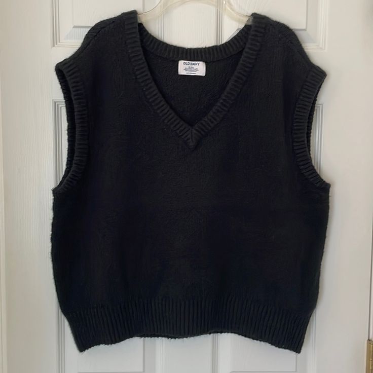 Old Navy Black V-Neck Layering Sweater Vest. V-Neck Sleeveless Vest. 56% Cotton 36% Polyester 7% Nylon 1% Spandex. Machine Wash Cold Gentle. Never Worn, Like New Condition. Stretch V-neck Vest For Fall, Black V-neck Vest For Winter, Black Stretch V-neck Sweater Vest, Casual Black Sweater Vest For Work, Casual Black V-neck Sweater Vest, Black Sweater Vest Outfit, Dark Academia Vest, Slytherin Costume, Black Sweater Vest