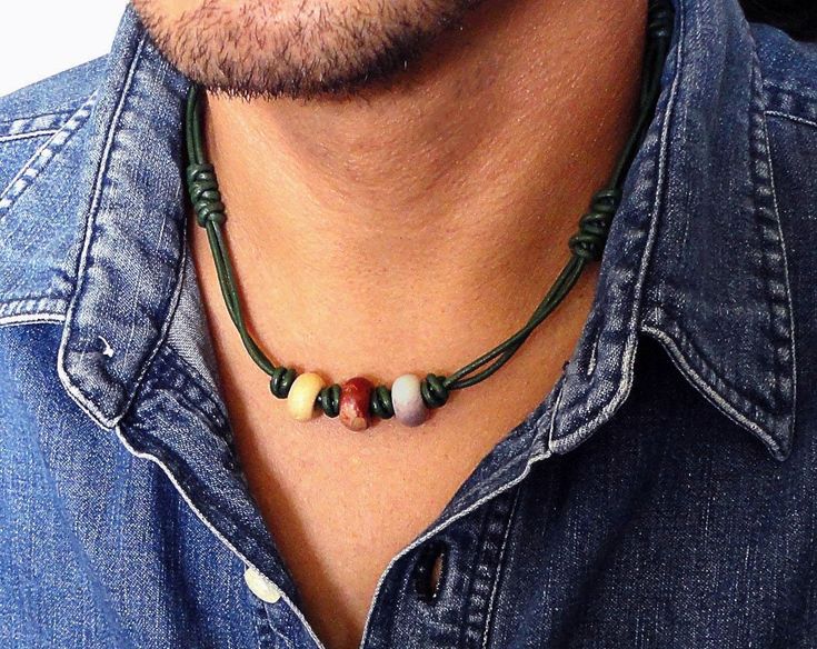 "This is a tribal-inspired choker necklace for men or unisex handcrafted in my studio. It is made with a genuine leather cord in green, which I hand-knotted and braided with a special technique, and accentuated with natural gemstones. This casual leather necklace closes with an antiqued finish brass hook clasp. Please select from the stone color options. Option A: Mookaite Jasper and Indian Agate Option B: Picture Jasper, Rainbow Jasper, Indian Agate Option C: Indian Agate and Rainbow Jasper Len Casual Leather Jewelry For Festivals, Gem Studio, Mens Choker, Delicate Diamond Necklace, Mens Choker Necklace, Indian Agate, Bracelet Pandora, Solitaire Necklaces, Necklace For Men