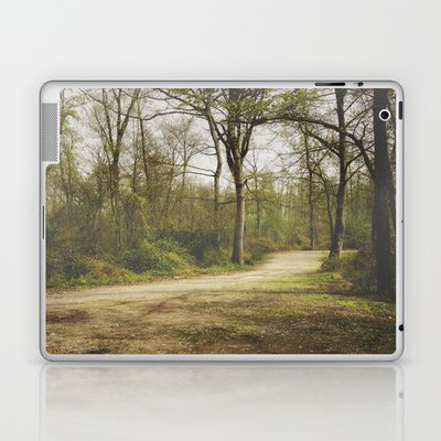 a dirt road surrounded by trees in the middle of a forest canvas wall art print