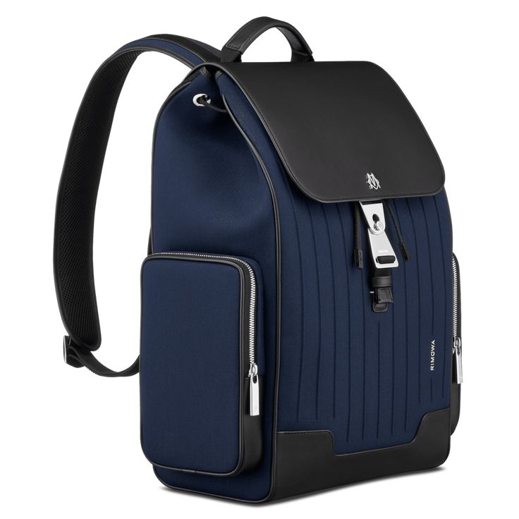 Made in Italy, the RIMOWA Never Still collection is designed with flexibility in mind. Crafted out of premium materials like durable canvas and full-grain leather, the drawstring RIMOWA Never Still Flap Backpack Large in Navy blue & Black features two side zipped pockets, adjustable shoulder straps (min 22 cm, max 41 cm), a padded back for added comfort, and a flap-top secured by a bespoke magnetic buckle emblazoned with the RIMOWA logo. Inside, a large drawstring compartment and a 16-inch l My Style Bags, Flap Backpack, Daily Bag, Mens Travel Bag, Backpack Sport, Luggage Sets, Large Backpack, Men's Backpack, Sport Bag