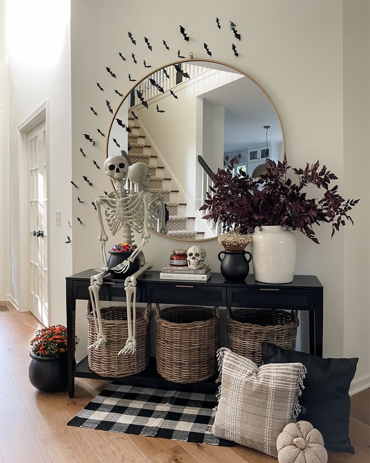 a living room filled with furniture and a large mirror over the top of a table