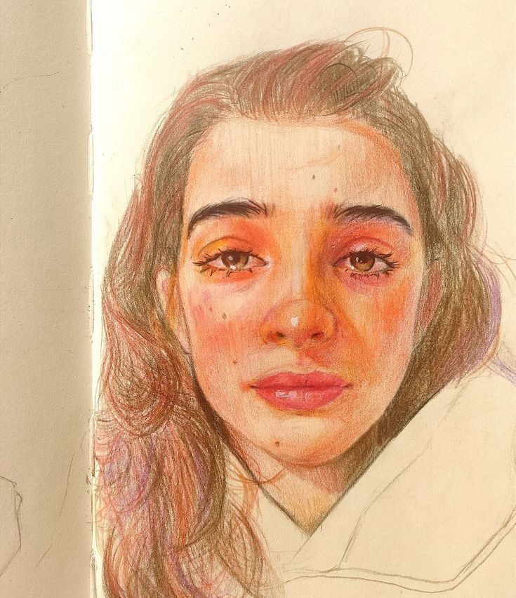 a drawing of a woman's face in colored pencil