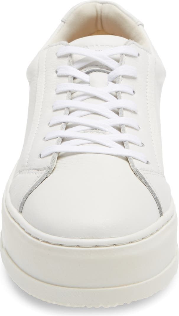 White Leather Chunky Sneakers With Textured Sole, White Leather Low-top Chunky Sneakers, White Leather Chunky Sneakers With Contrast Sole, Modern White Platform Sneakers With Textured Sole, Modern White Platform Sneakers With Contrast Sole, Modern White Wedge Sneakers With Contrast Sole, White Leather Platform Sneakers For Streetwear, White Platform Sneakers With Rubber Sole, Medium Fit, White Leather Platform Sneakers With Rubber Sole