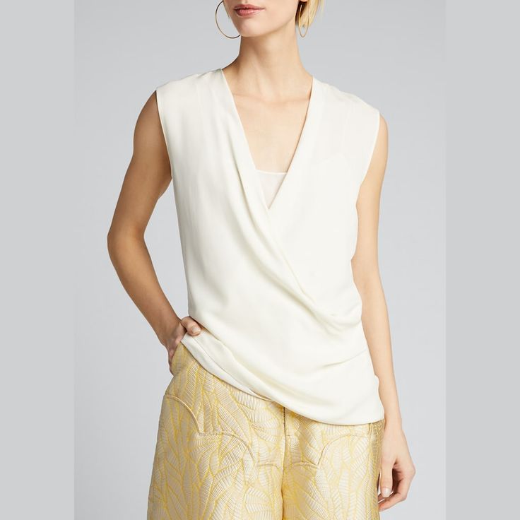 Theory shell with draped-front bodice. Surplice neckline. Sleeveless. Relaxed silhouette. Pullover style. Silk. Unlined. Imported. Sleeveless Silk Ruched Top, Elegant Sleeveless Ruched Tops, Sleeveless Ruched Silk Top, Sleeveless Silk Top With Ruched Detail, Formal Sleeveless Ruched Top, Elegant Drapey Sleeveless Top, Ivory Drapes, Surplice Neckline, Bergdorf Goodman