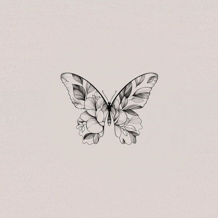 a black and white drawing of a butterfly with flowers on it's back wing