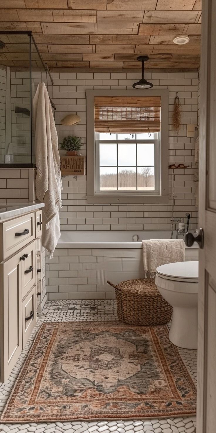 a bathroom with a rug on the floor