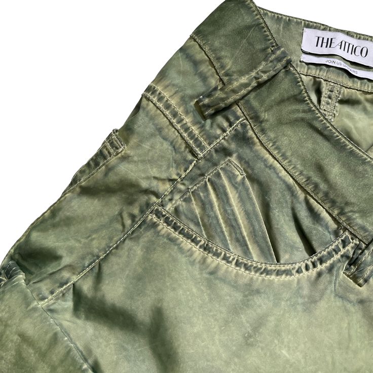 THE ATTICO Fern Long Pant in Military GreenSize 36IT // US XXSmallColor Wash Green Preloved **Fading and blemishes of color are part of these pants' style.**Please check measurements and brand size chart before purchasing.**Both sides of the pants had loose threads and were professionally repaired. Please take a look at pictures number 4 and 5.Approx. Measurements Inseam 34.5"Waist 14.5"Hips 17.5"Rise 11"Website DetailsSelf: 100% polyesterLining: 100% cotton. Made in Italy. Hand wash. Zip fly wi Green Wide Leg Pants With Five Pockets, High-waisted Green Pants With Five Pockets, Green High Waist Pants With Five Pockets, High Waist Green Pants With Five Pockets, Fitted Cargo Pants With Five Pockets, Green Straight Leg Pants With Five Pockets, Green High Waist Bottoms With Five Pockets, Green Fitted Straight Cargo Pants, Green Tapered Leg Cargo Pants With Five Pockets