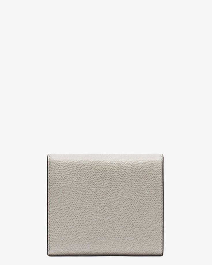 Valextra Iside Fold Wallet in Ash Grey Twist-lock closure 3 card slots Zip-fastening coin pouch Leather outer and lining 4.7”W x 3.5”H x .8”D Made in Italy Valextra Iside, Fold Wallet, Coin Pouch, Leather Pouch, Ash Grey, Card Slots, Slots, Ash, Coin