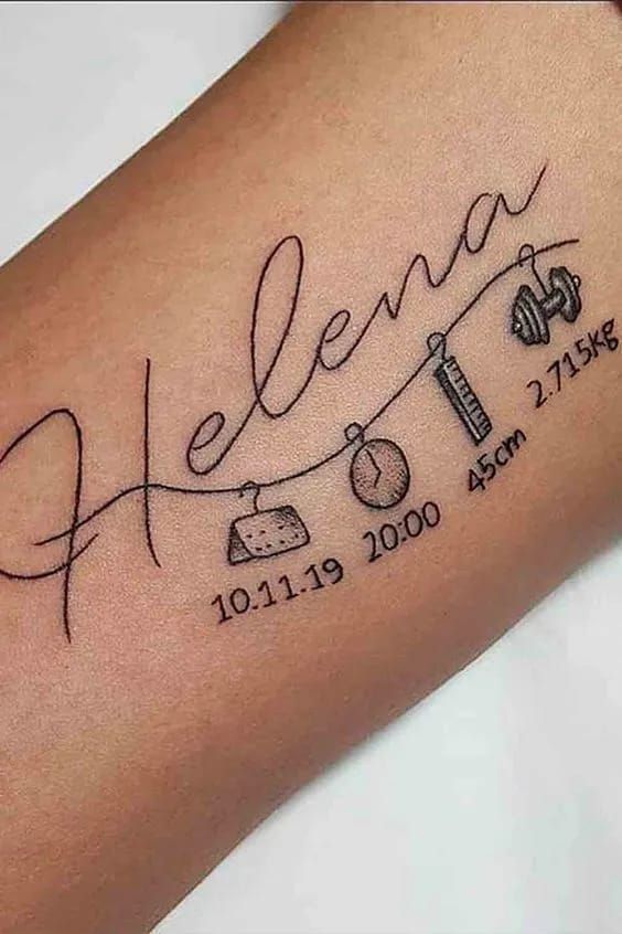 a woman's arm with the name and date tattooed on it