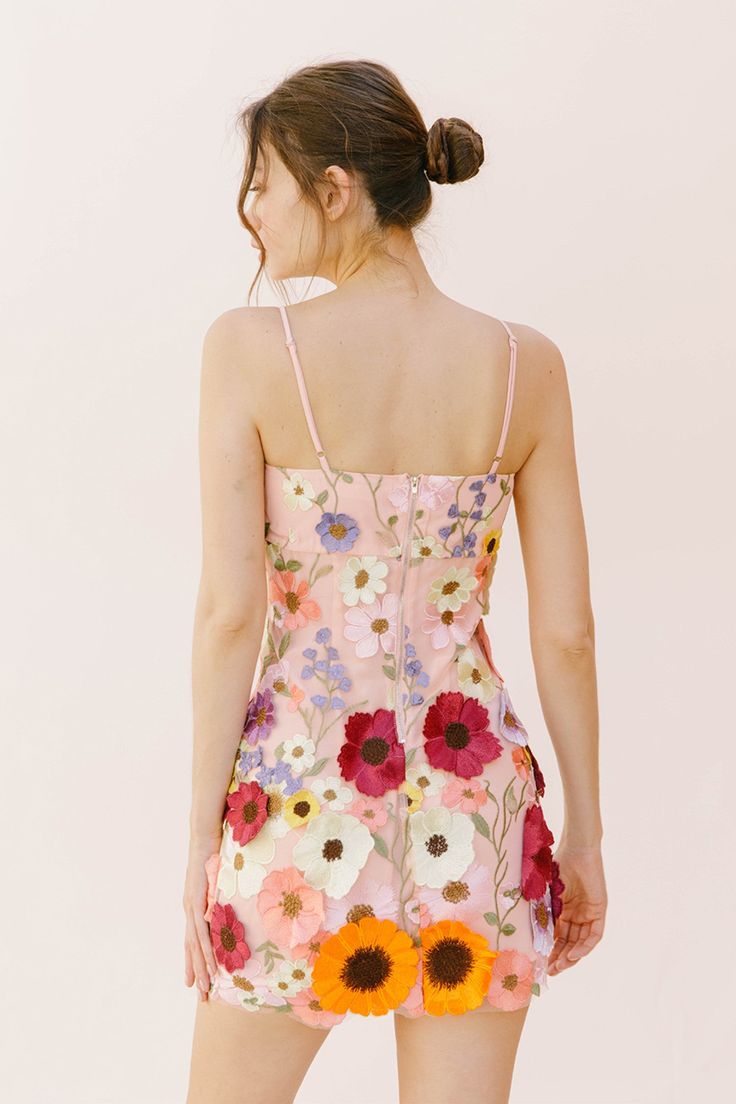 -Color: Multi Floral -Adjustable straps -Minimal stretch -Lined with tulle overlay -Back zipper closure -Content: 100% Polyester -Imported -Runs true to size but short in length Embroidered Mini Dress, Fabric Display, Minimalist Accessories, 3d Flowers, Dress Cuts, Floral Mini Dress, Dresses With Leggings, Hip Length, Xl Dress