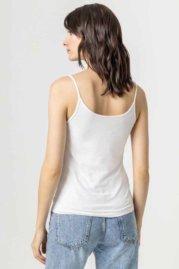 Our layering pieces have been relaunched and are better than ever! We used beautiful Pima cotton and add a touch of Spandex for the perfect fit. With narrow trims, our camisole is clean and simple and layers beautifully under any fabric. Cotton Tops With Built-in Bra For Daywear, Cotton Scoop Neck Camisole For Daywear, Elegant Everyday Cotton Tank Top, Elegant Tops With Adjustable Straps For Layering, Elegant Cotton Tank Top For Layering, Elegant Cotton Tank Top With Adjustable Straps, Fitted Camisole With Spaghetti Straps For Everyday, Fitted Spaghetti Strap Camisole For Everyday, Everyday Fitted Camisole With Spaghetti Straps